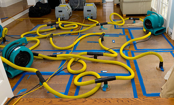 Professional Storm Water Damage Restoration technician working in Washington, OK